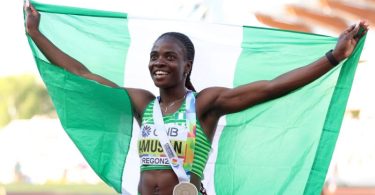 Tobi Amusan is an elegant dark skinned African who has successfully served her country and made her proud. After getting an award during the 2018 Asaba African Championship, while she held the country's flag, she said, "Unknown now, but I will persist till I am Unforgettable," then we have her result.