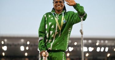 Nigeria's Goodness Chiemerie Nwachukwu celebrates on the podium Photo by BEN STANSALL-AFP via Getty Image