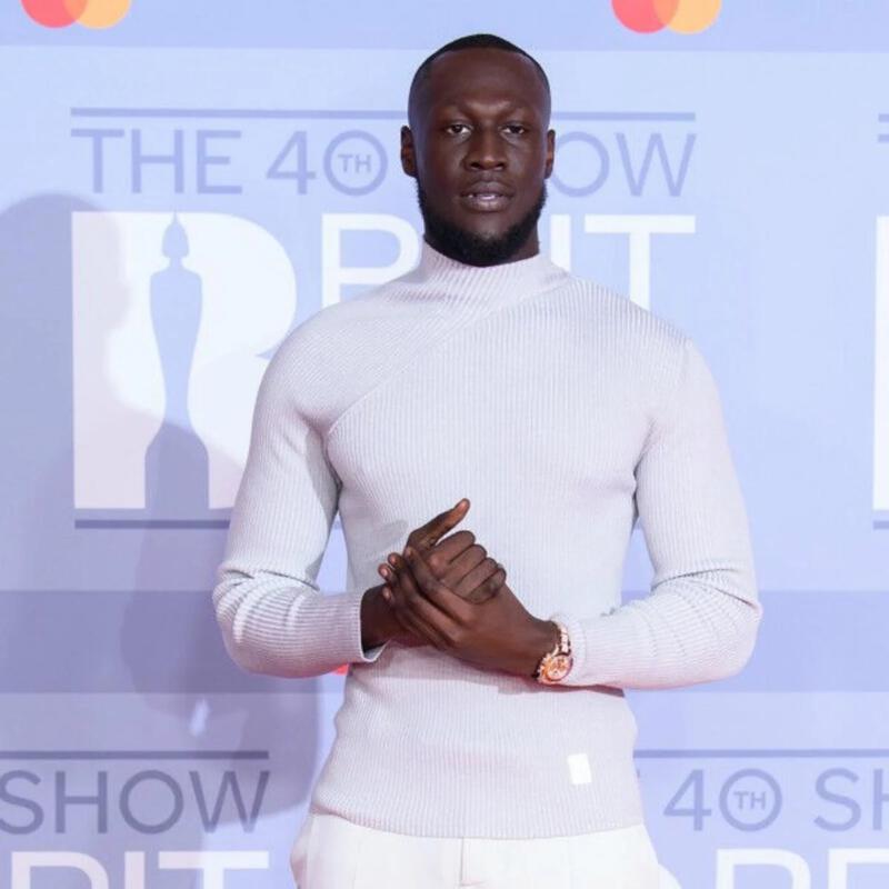 Stormzy is a musician from the United Kingdom who is known for his rapping and songwriting. On July 6, 1993, he was brought into this world. Michael Ebenezer Kwadjo Omari Owuo Jr. is the name he was given at birth. Stormzy sprang to prominence on the underground music scene in the United Kingdom thanks to his Wicked Skengman series freestyles performed over traditional Grimes tracks.