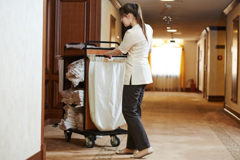 In the hotel industry, housekeeping and room service are two essential services with distinct functions. The primary responsibility of housekeeping is to maintain sanitation and order throughout the hotel, particularly in guest rooms and common areas. Typical duties include replacing bed linens, cleaning restrooms, vacuuming, dusting, and restocking amenities. Ensuring visitors a clean, hygienic, and comfortable environment is the essence of housekeeping.