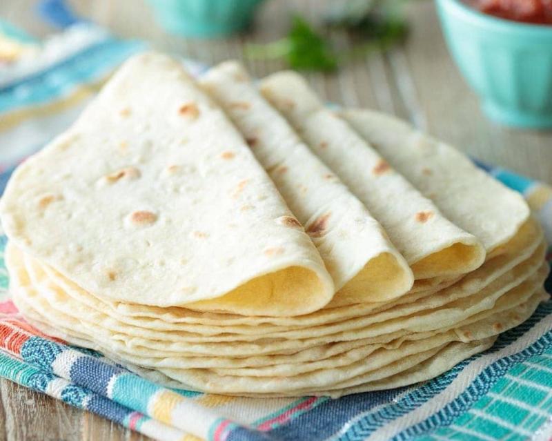 The significant difference between tortilla and chapati indicates that a tortilla is a flatbread consisting of corn flour and, most times, wheat flour to be consumed with a stuffing. In contrast, chapati is described as a slim balanced rati that is consisted of whole wheat flour described as atta and administered with side curries and chutney.